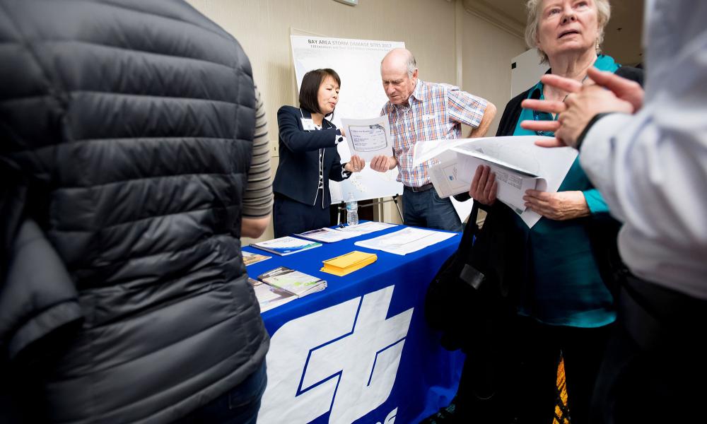 Caltrans representative Laurie Lau (left) engages with the public at the Plan Bay Area 2040 open house in Walnut Creek.
